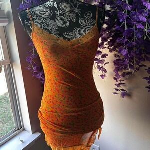 Orange floral slip dress by Motel with pink and green print